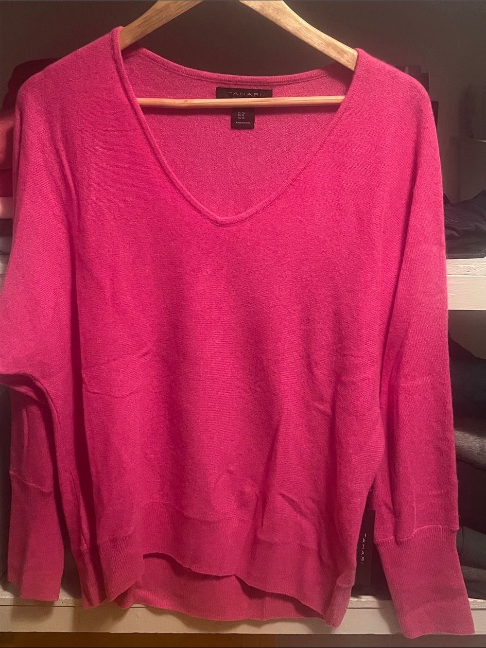 100 percent casement. New with tags. 
Tahari V-Neck Sweater in Hot Pink